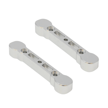 Two metallic metal brackets on a white background