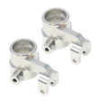 Two metallic metal suspension links on a white background