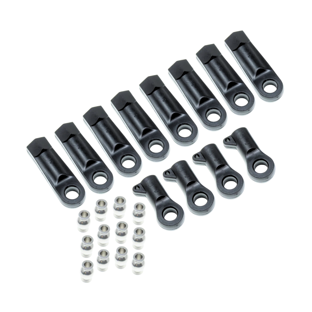Set of black metal mechanical components on a white background