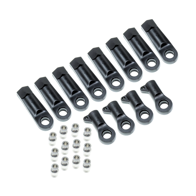 Set of black metal mechanical components on a white background