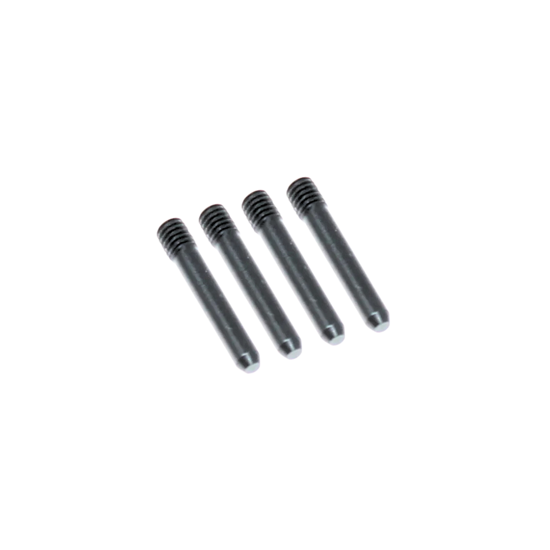 Four black cylindrical objects on a white background