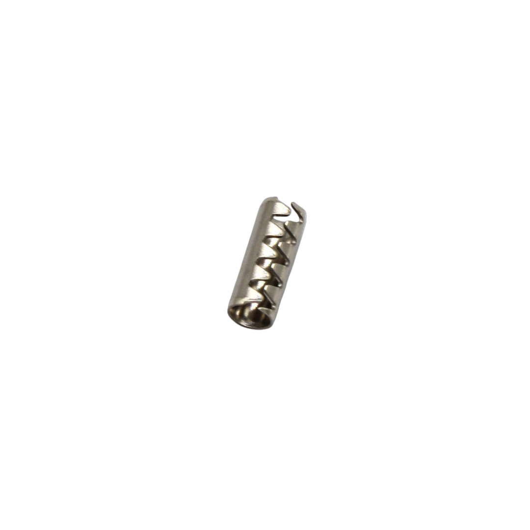 Metallic cylindrical object with textured surface on a white background