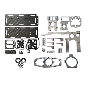 Collection of mechanical parts including carbon fiber plates, metal brackets, and gaskets on a white background.