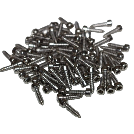 Pile of metal screws on a white background