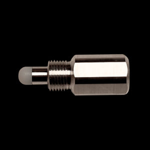 A silver-colored metal RC engine piston stopper against a black background.