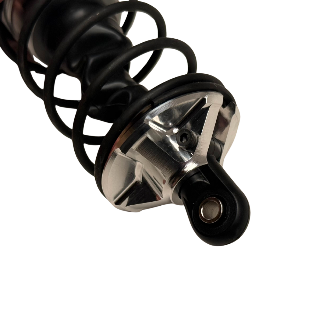 Taylor Losi 5IVE-T 3.0 raw silver billet shock perch fitted to a black shock with spring, angled view showing the grub screw and shock end