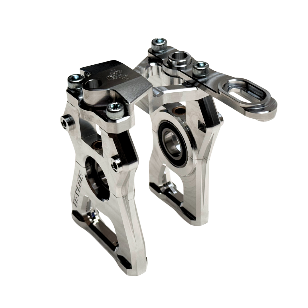 Taylor Losi 5ive-TG 3.0 raw silver billet centre diff mount assembled with sealed bearing visible in the mount half