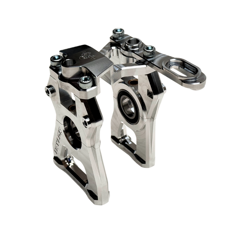 Taylor Losi 5ive-TG 3.0 raw silver billet centre diff mount assembled with sealed bearing visible in the mount half