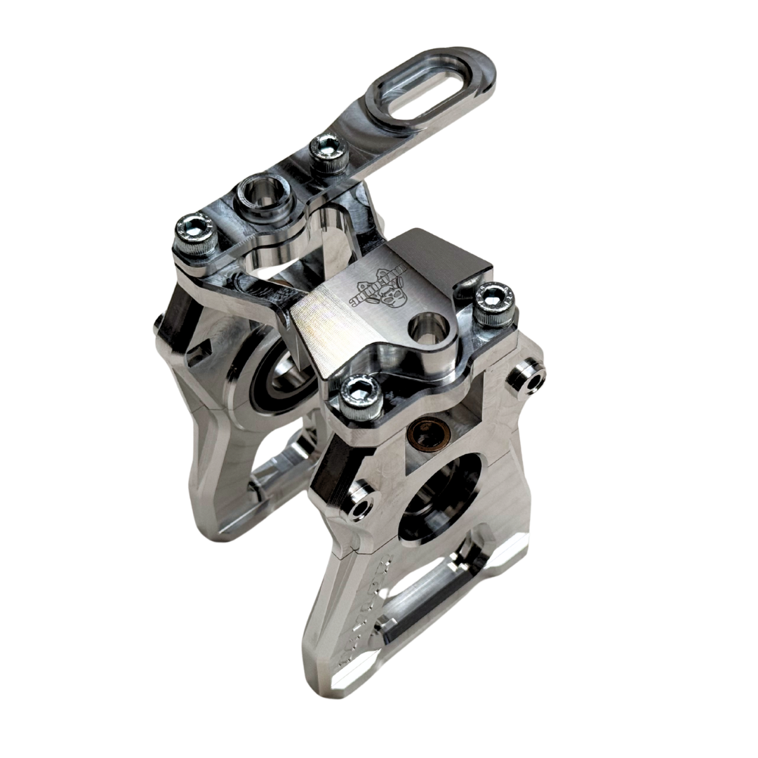Taylor Losi 5ive-TG 3.0 raw silver billet centre diff mount assembled, showing engraved skull logo and socket cap screws