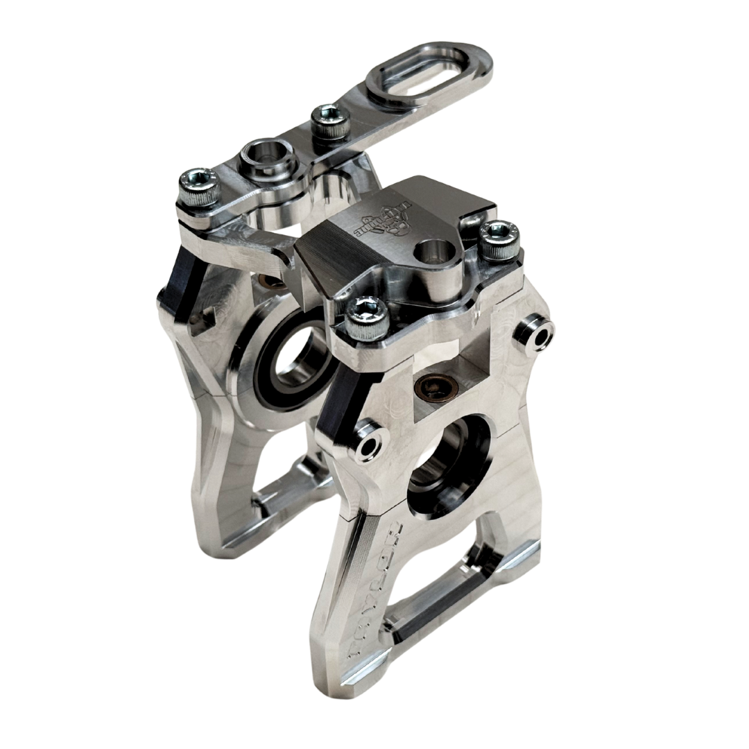 Taylor Losi 5ive-TG 3.0 raw silver billet centre diff mount assembled, showing engraved Taylor logo and rapid removal top plate