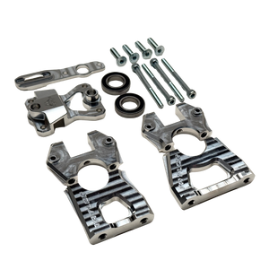 Taylor Losi 5ive-TG 3.0 centre diff mount kit contents from above, with machined black anodised mount halves, raw silver parts and fixings