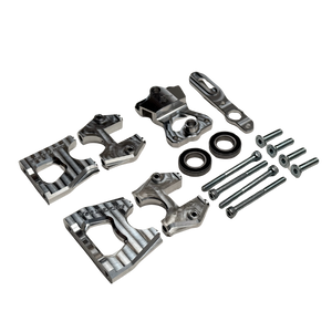Taylor Losi 5ive-TG 3.0 billet centre diff mount kit contents, including mount halves, rapid removal plate, lever, two bearings, cap screws and countersunk screws