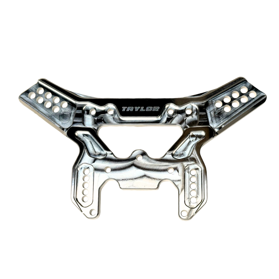 Taylor Losi 5T, 5IVE 2.0 and 5IVE-TG 3.0 raw silver billet 7075 rear shock tower, showing the shock mounting holes, slotted adjustment holes and Taylor logo