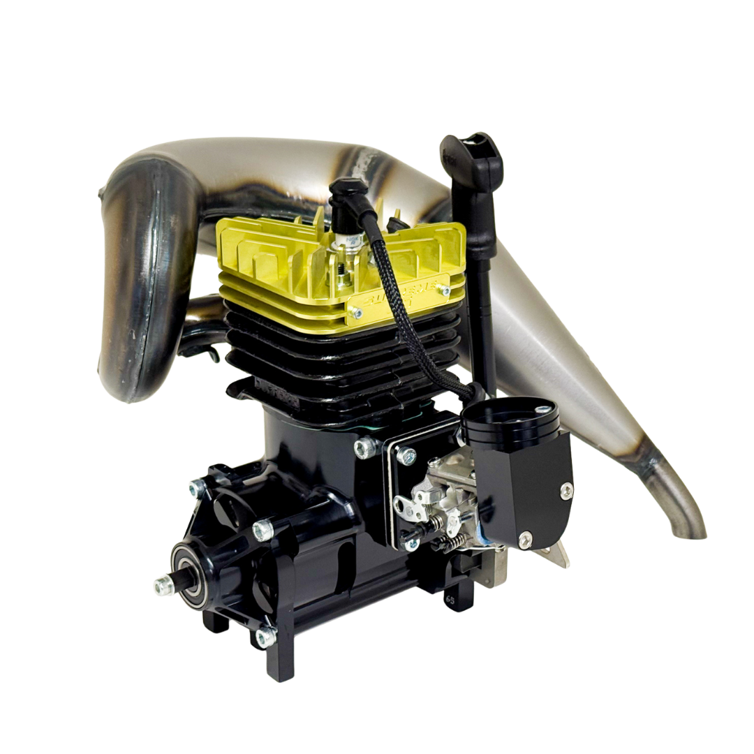 Angled view of the Taylor RC 65cc Supreme V2 engine showing the yellow head, carburettor and tuned exhaust pipe