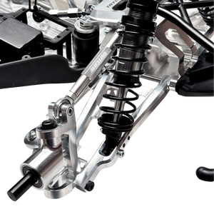 Taylor RC Complete Outlaw V4 Billet Hybrid Slider, close-up of the front suspension arm, shock, and wheel hub