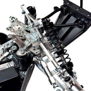 Taylor RC Complete Outlaw V4 Billet Hybrid Slider, close-up of the front suspension linkages, shocks, and drivetrain components