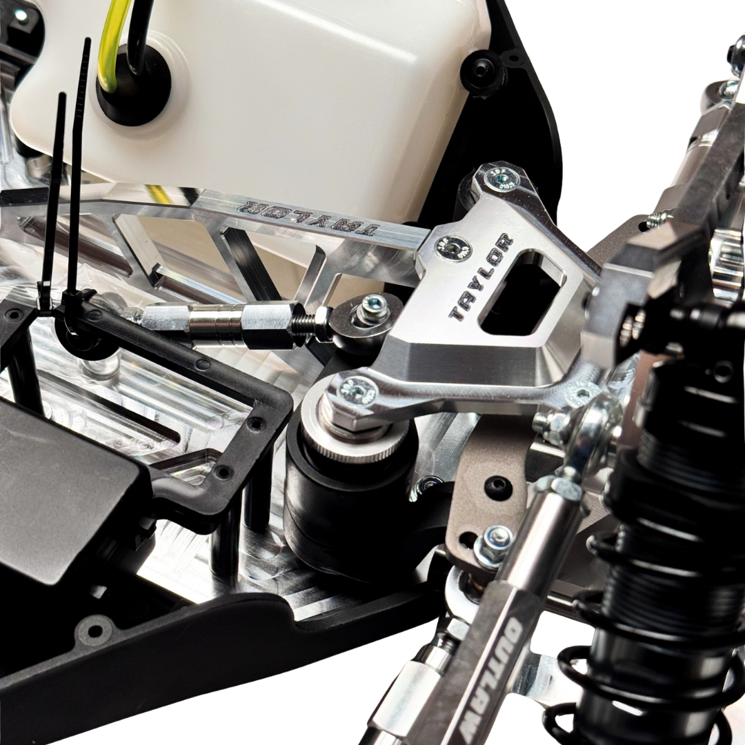 Taylor RC Complete Outlaw V4 Billet Hybrid Slider, close-up of the front suspension with Taylor branded shock tower and fuel tank