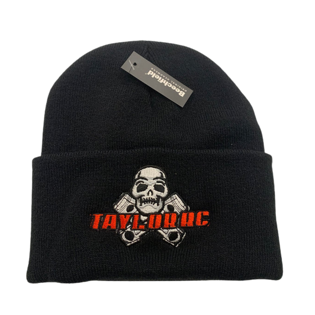 Black beanie with skull and crossbones design and 'Taylor RC' branding.