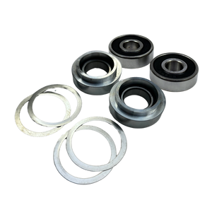 Taylor RC Losi 5ive diff housing complete bearing rebuild kit, angled view showing two sealed bearings, two bearing carriers, and four shims