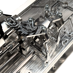 Close-up of a mechanical device with metal components on a white background