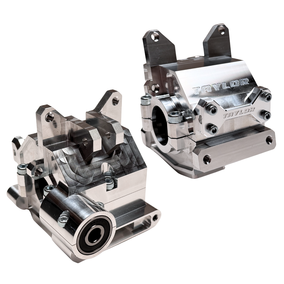 Two metal mechanical components with 'Taylor' branding on a white background