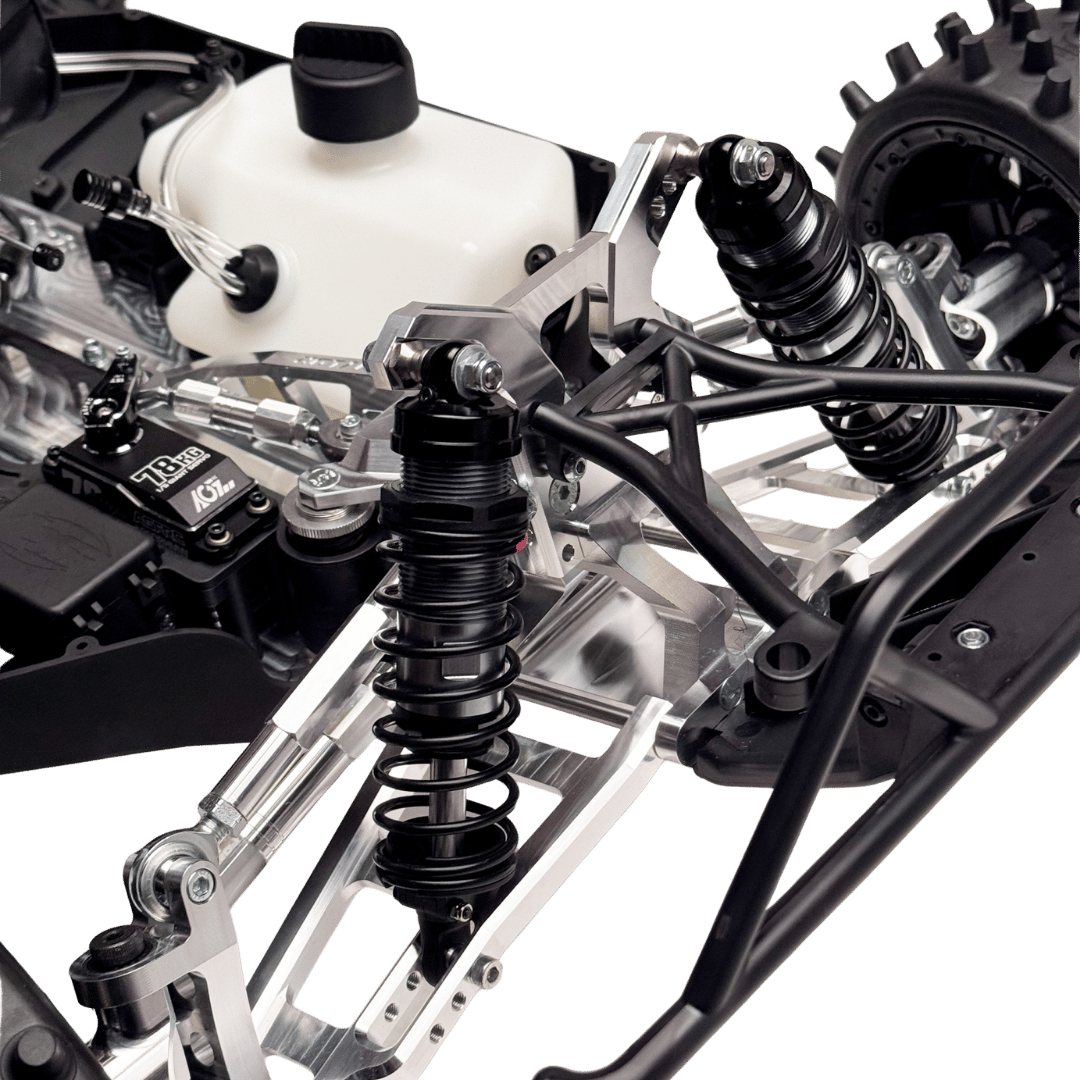 Close-up of a motorcycle suspension system on a green background