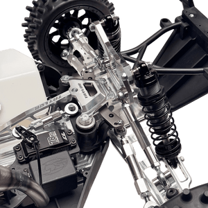 Close-up of a mechanical model with gears and suspension system on a transparent background