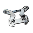 Taylor RC OUTLAW V4 front shock tower in raw silver, angled view showing the shock mounting holes, arm slots, and central chassis clearance cutout