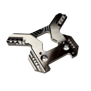 Taylor RC OUTLAW V4 front shock tower in raw silver, angled view from the opposite side showing the shock mounting holes and arm slots