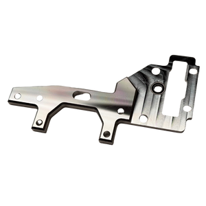 Taylor RC OUTLAW V4 upper transmission plate in raw silver, angled view showing the mounting holes, bearing bore, and slotted cutout