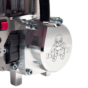 Close-up of a metallic mechanical component with a visible brand logo on a white background