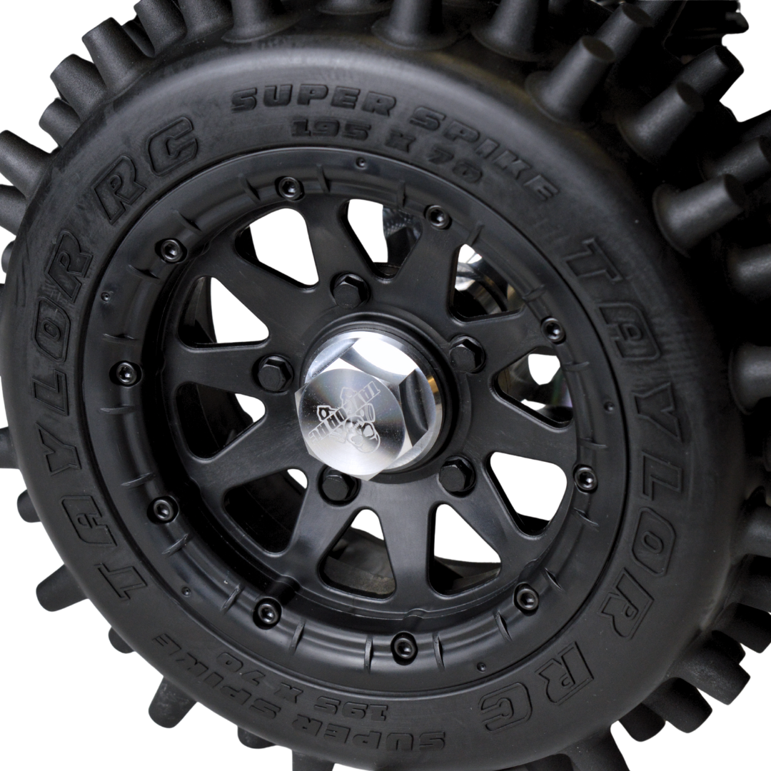 Close-up of a Taylor Super Spike RC tire on a white background