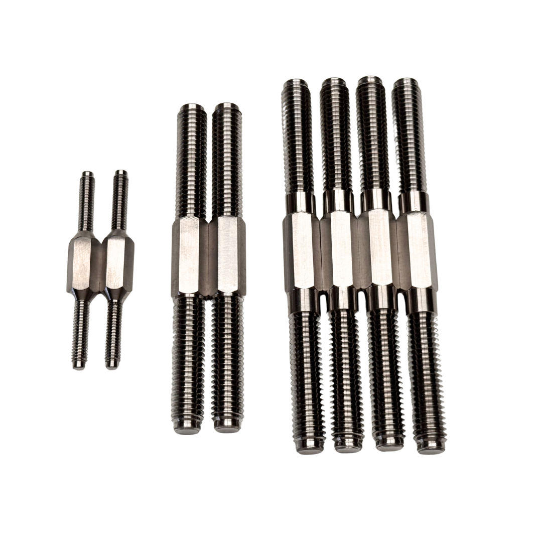 Set of titanium turnbuckles on a white background