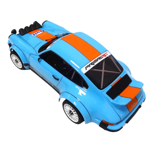 Blue and orange toy car with 'Primal Rc' branding on a white background
