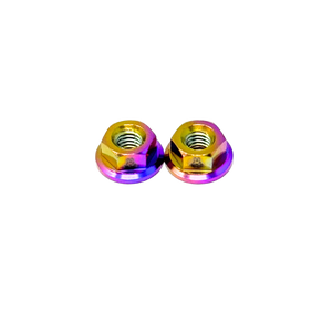 Two colorful metal nuts on a white background