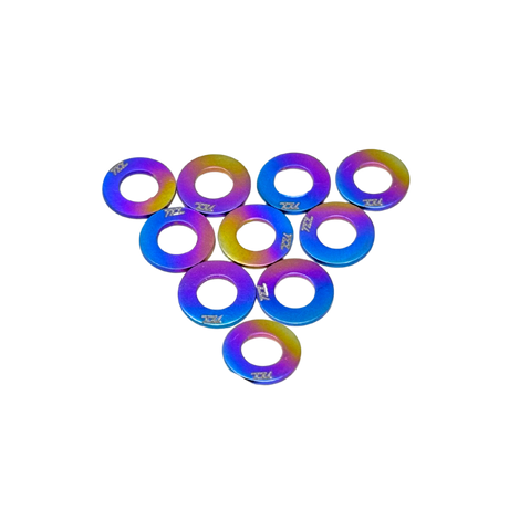 Set of colorful metallic washers on a white background