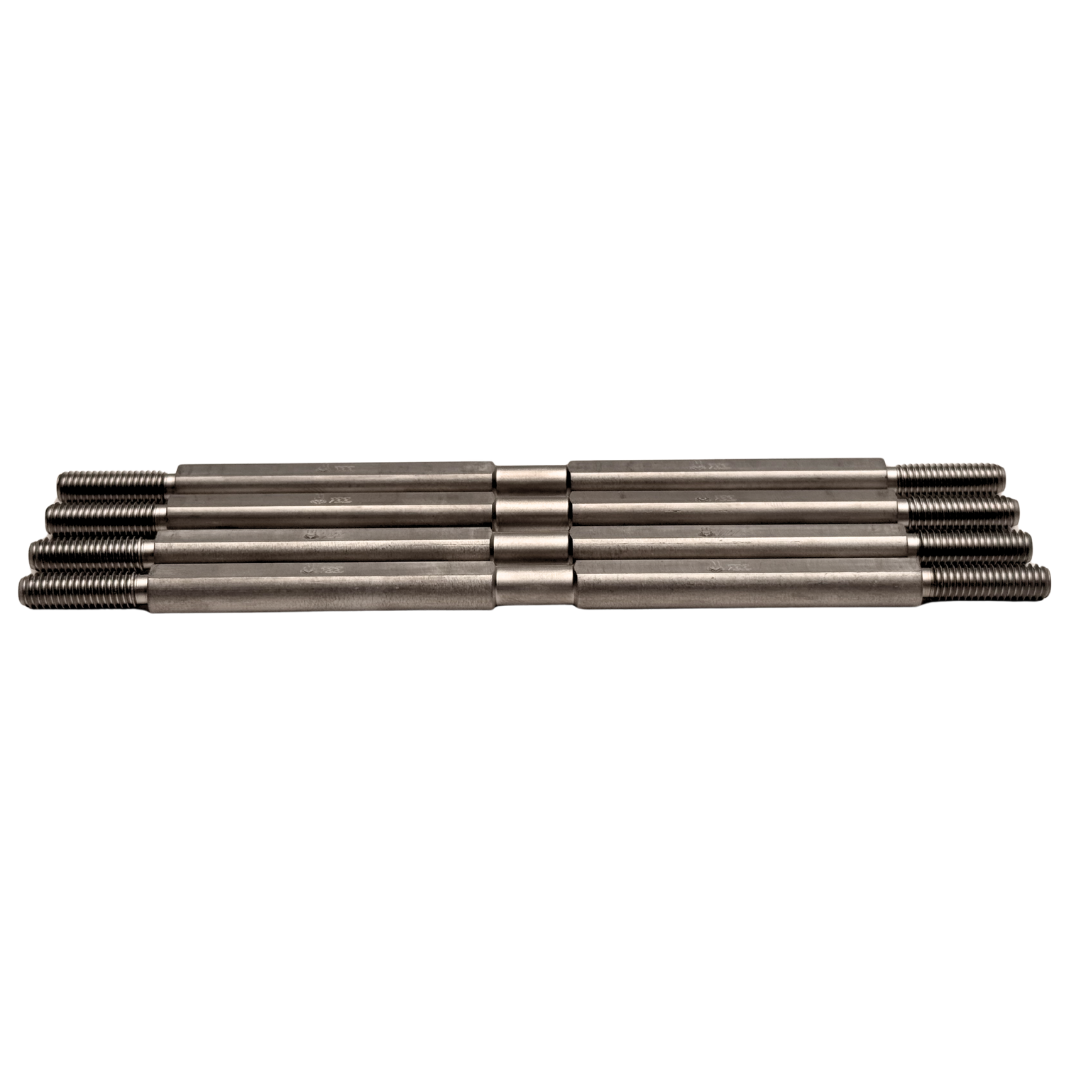 Set of four metal rods stacked on a white background