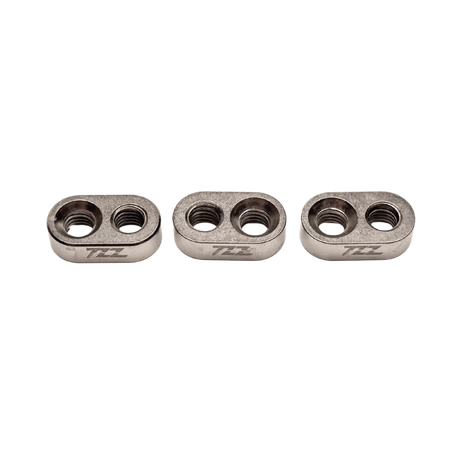 Three metallic components with 'TZZ' branding on a white background