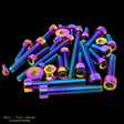A set of multicolored titanium alloy screws for a model car engine.