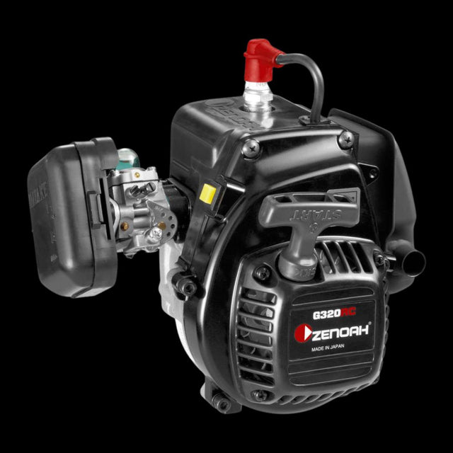 Zenoah G320 RC 31.8cc two-stroke engine for remote control cars, showing the black motor block with red and silver accents, and the brand label.